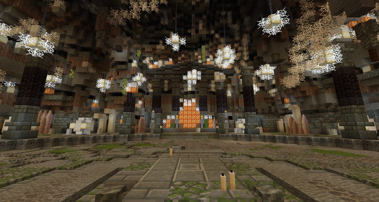 A web-draped cavern arena with an orange egg nest at the far wall